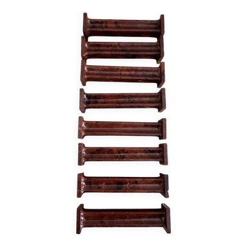 Ensemble de 8 portes couteaux en Bakélite effet acajou Art Déco