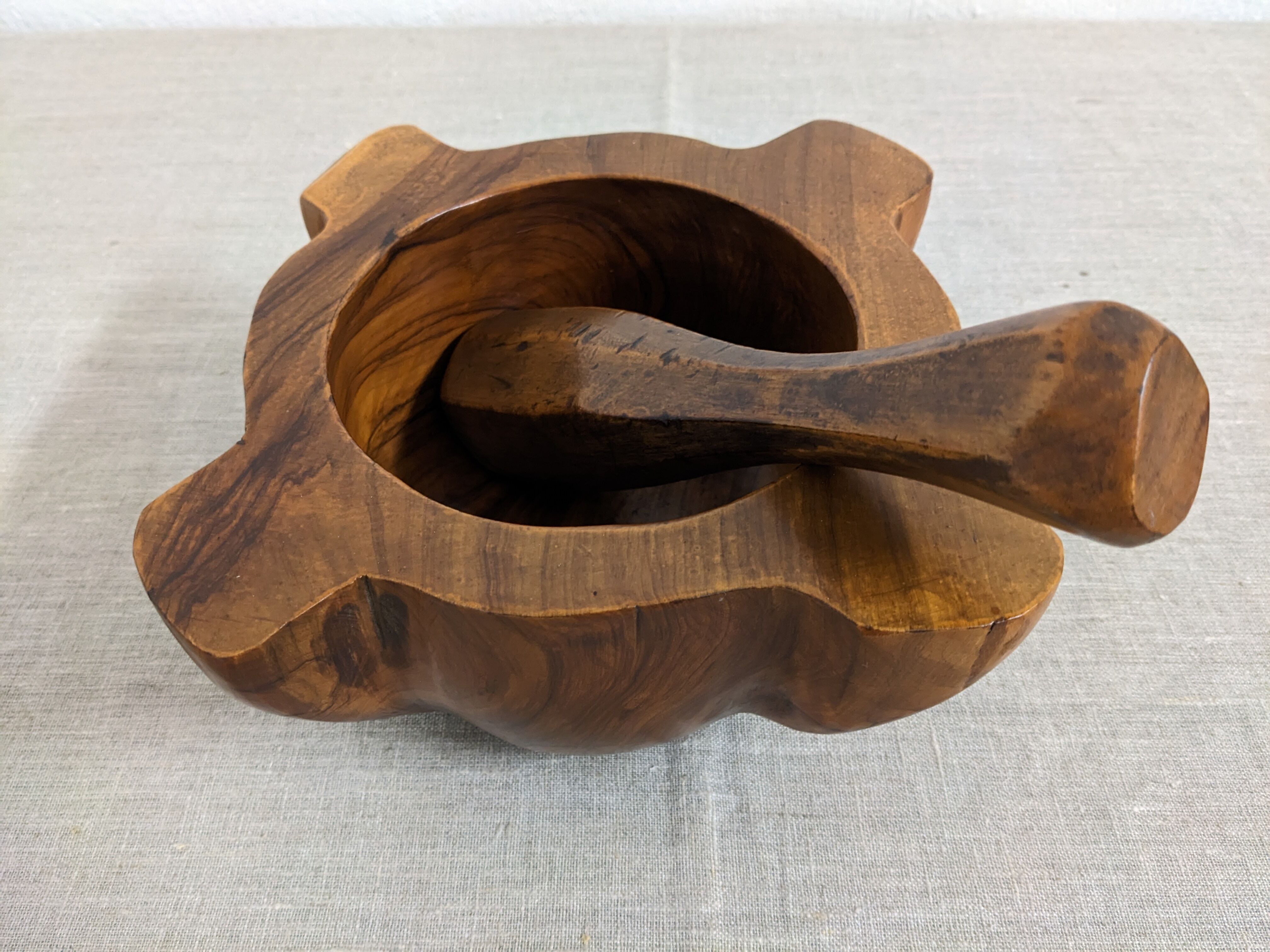 Mortar and its vintage olive wood pestle