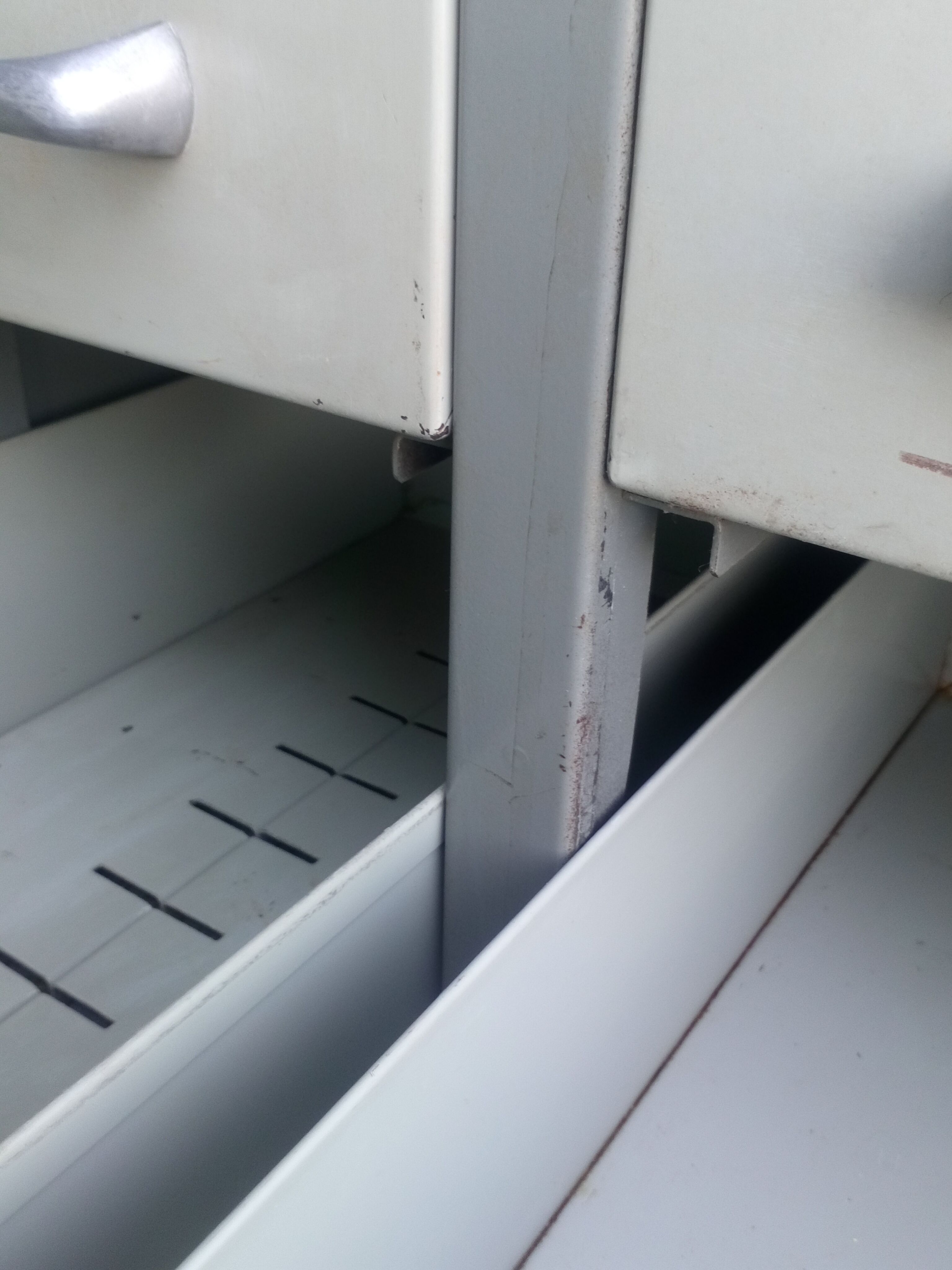 Industrial furniture with drawers on feet 1950