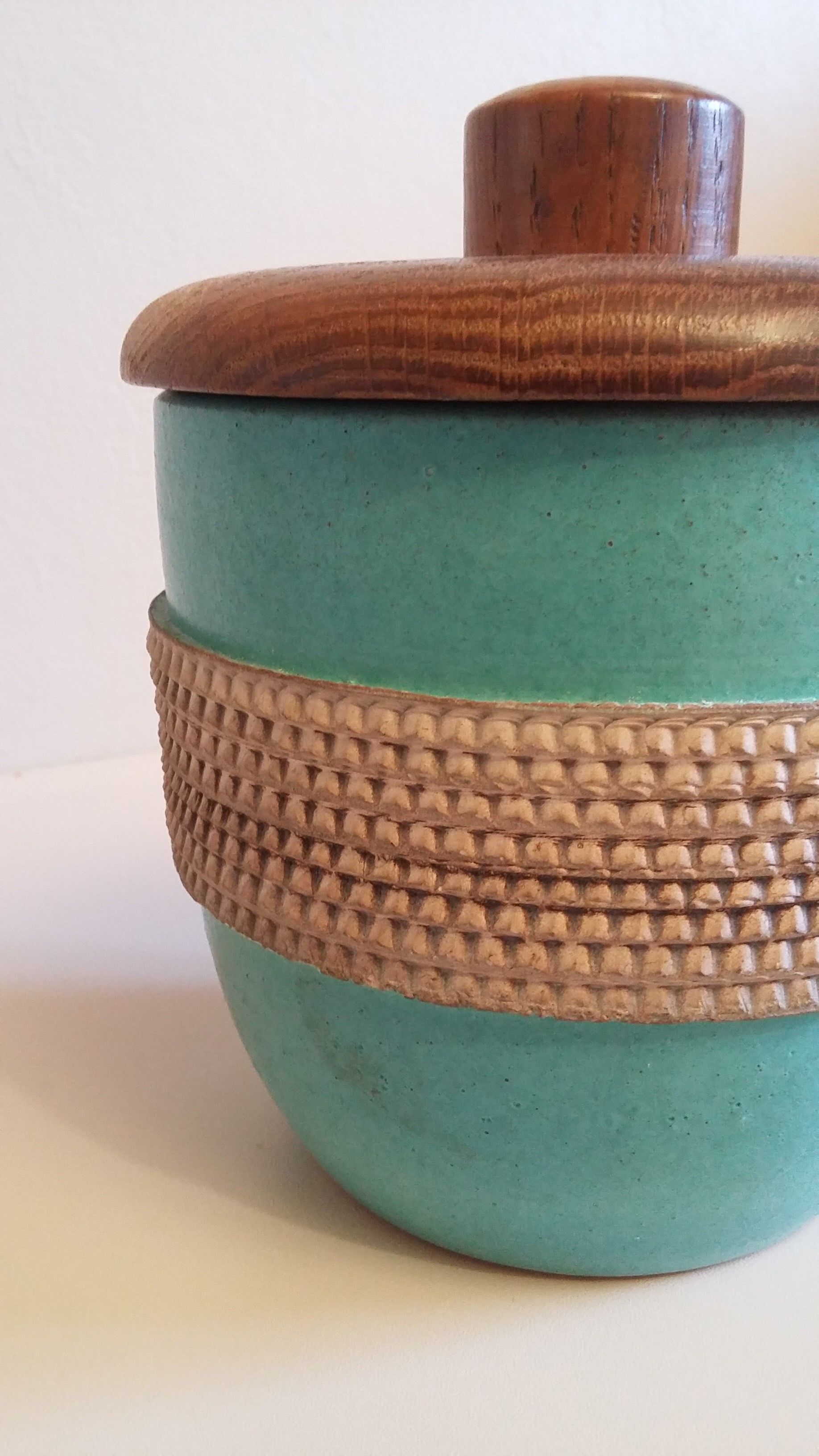 Earthenware pot with wooden lid