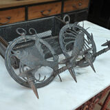 Pair of carved metal wall lamps signed RG