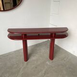 Red lacquered console and its mirror from the 80s