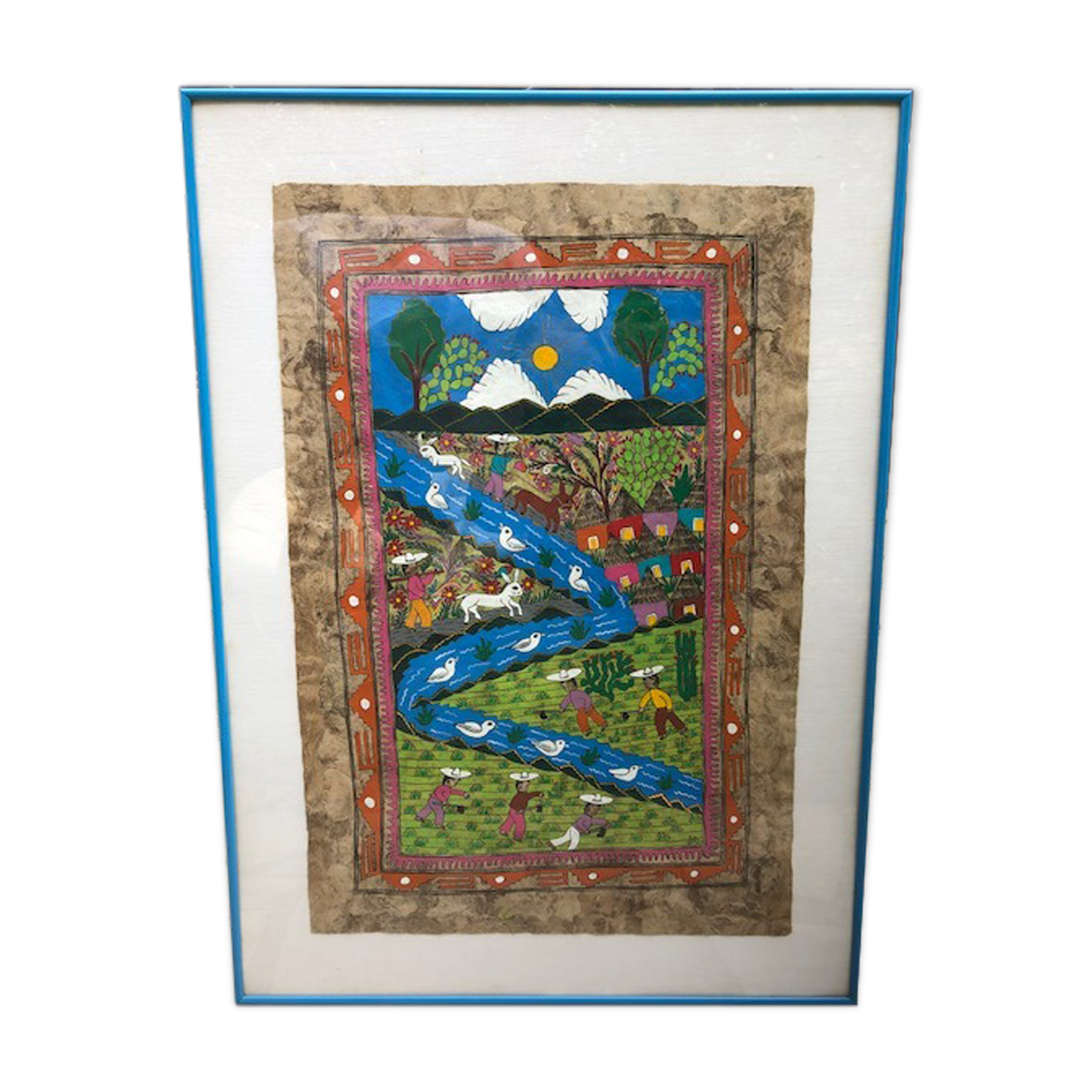 Table framed by a naïve Mexican illustration