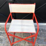 Folding metal armchair