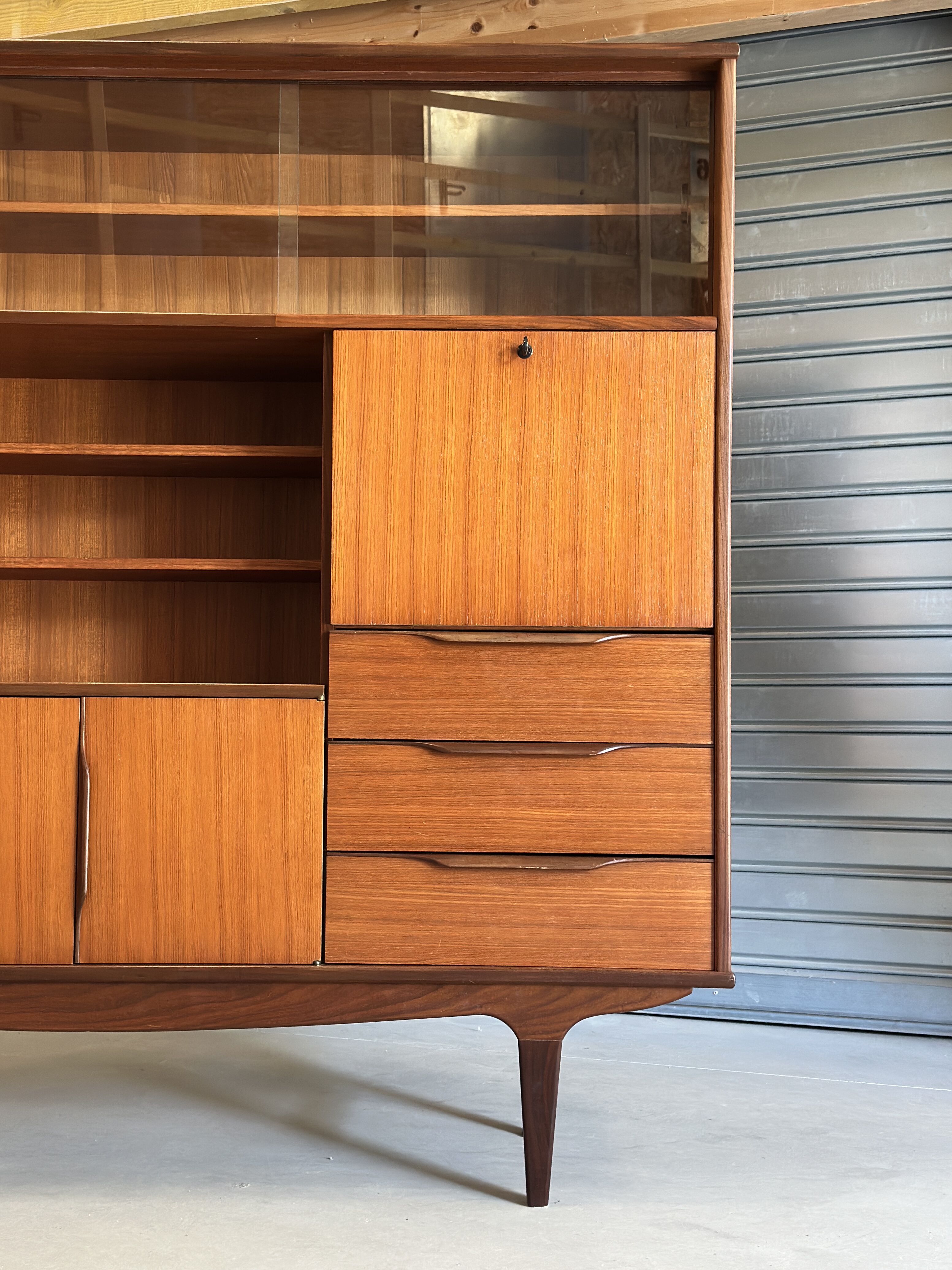 Very beautiful Scandinavian highboard in teak from the 1960s.