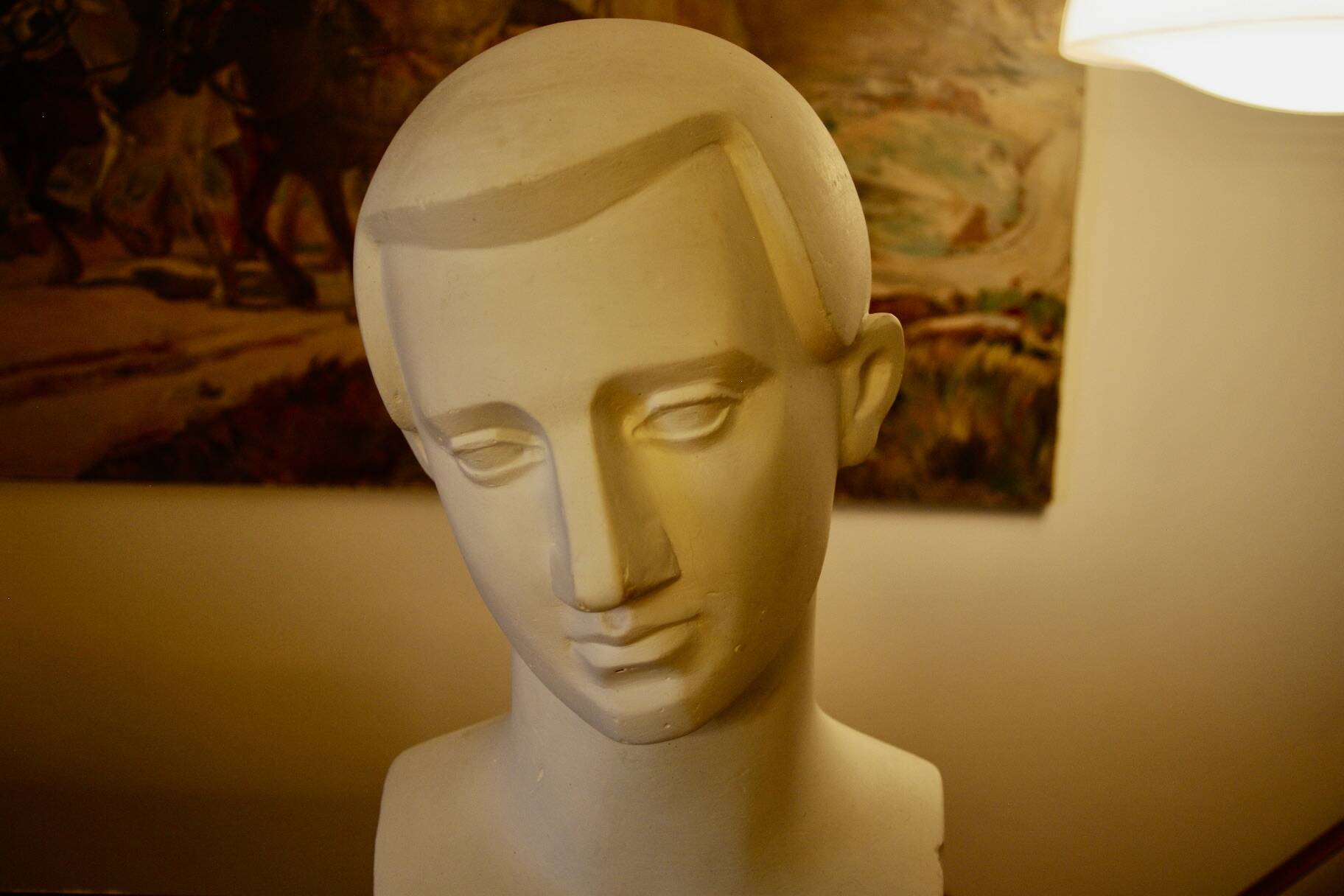 Art deco full plaster bust of a young man