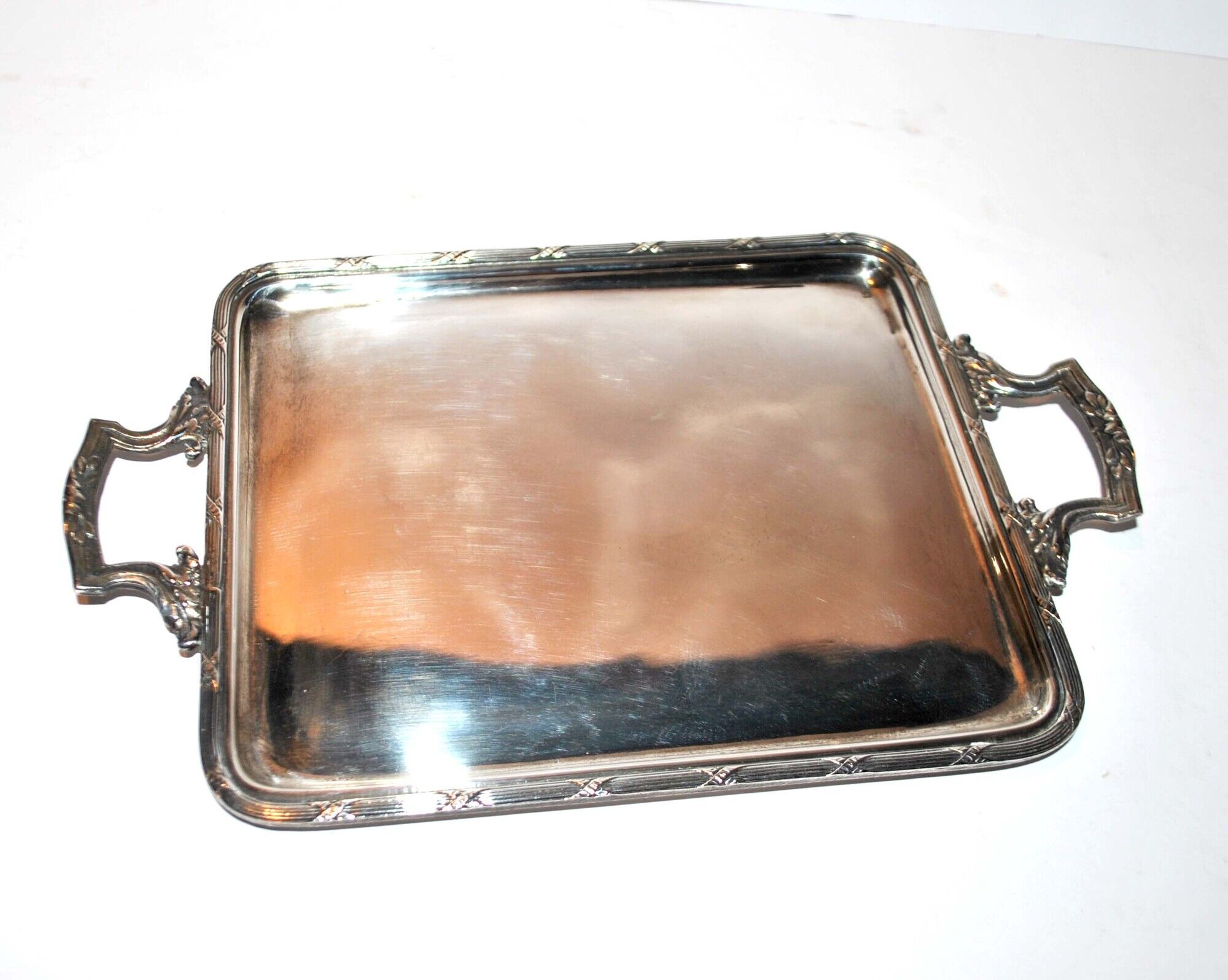 Antique silver metal top with crossed ribbons 21.5x15.5cm