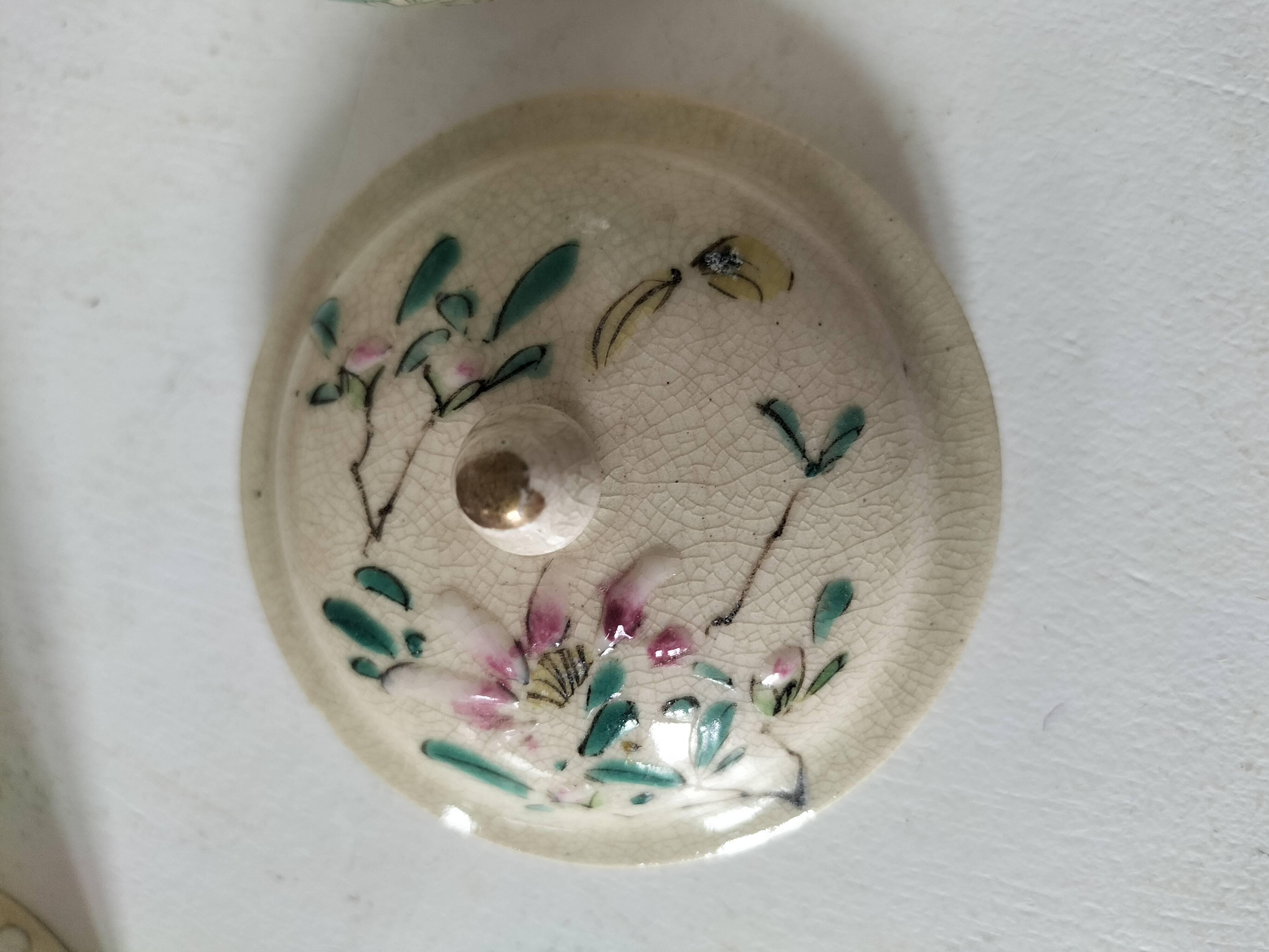 Japanese-style tea set in cracked earthenware with chrysanthemum flowers