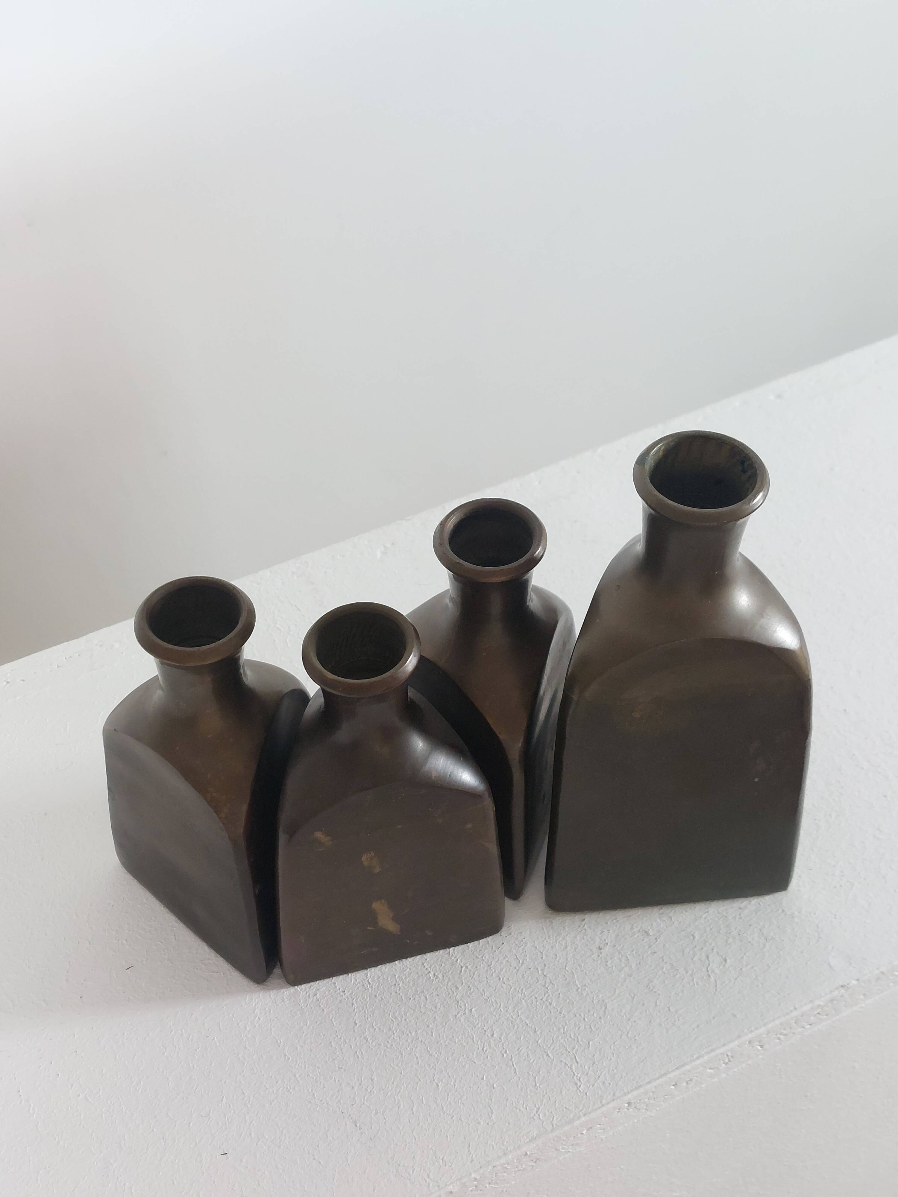 Vintage mid century Set of four triangular brass vases
