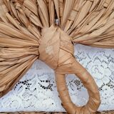 Heart fan in vintage woven palm leaves