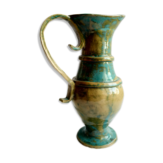 Modeled and enamelled vintage pitcher