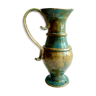 Modeled and enamelled vintage pitcher