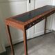 Perforated sheet metal and wood console