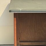 Modernist desk in wood and green moleskin upholstery