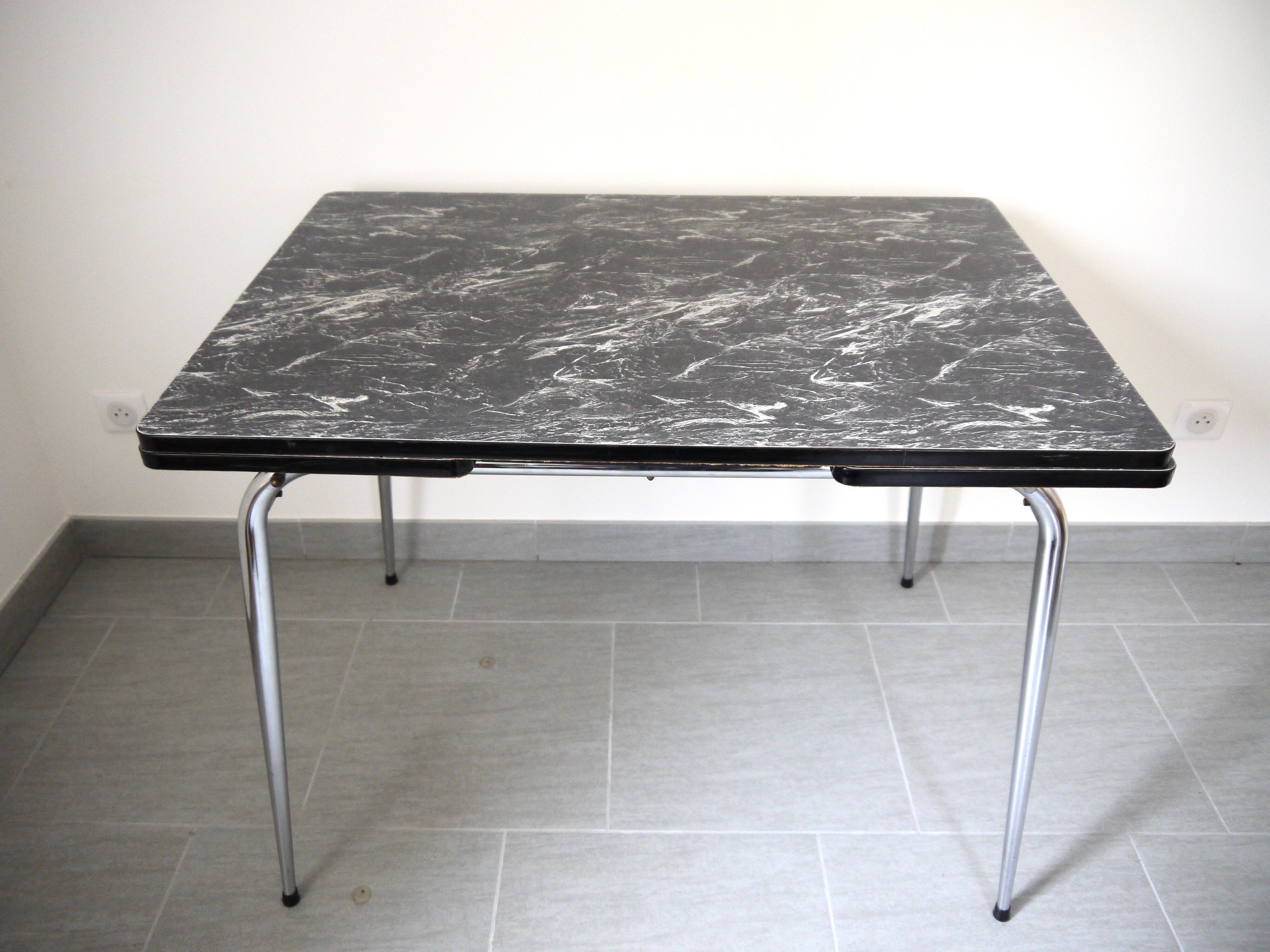 Black and white marbled formica table