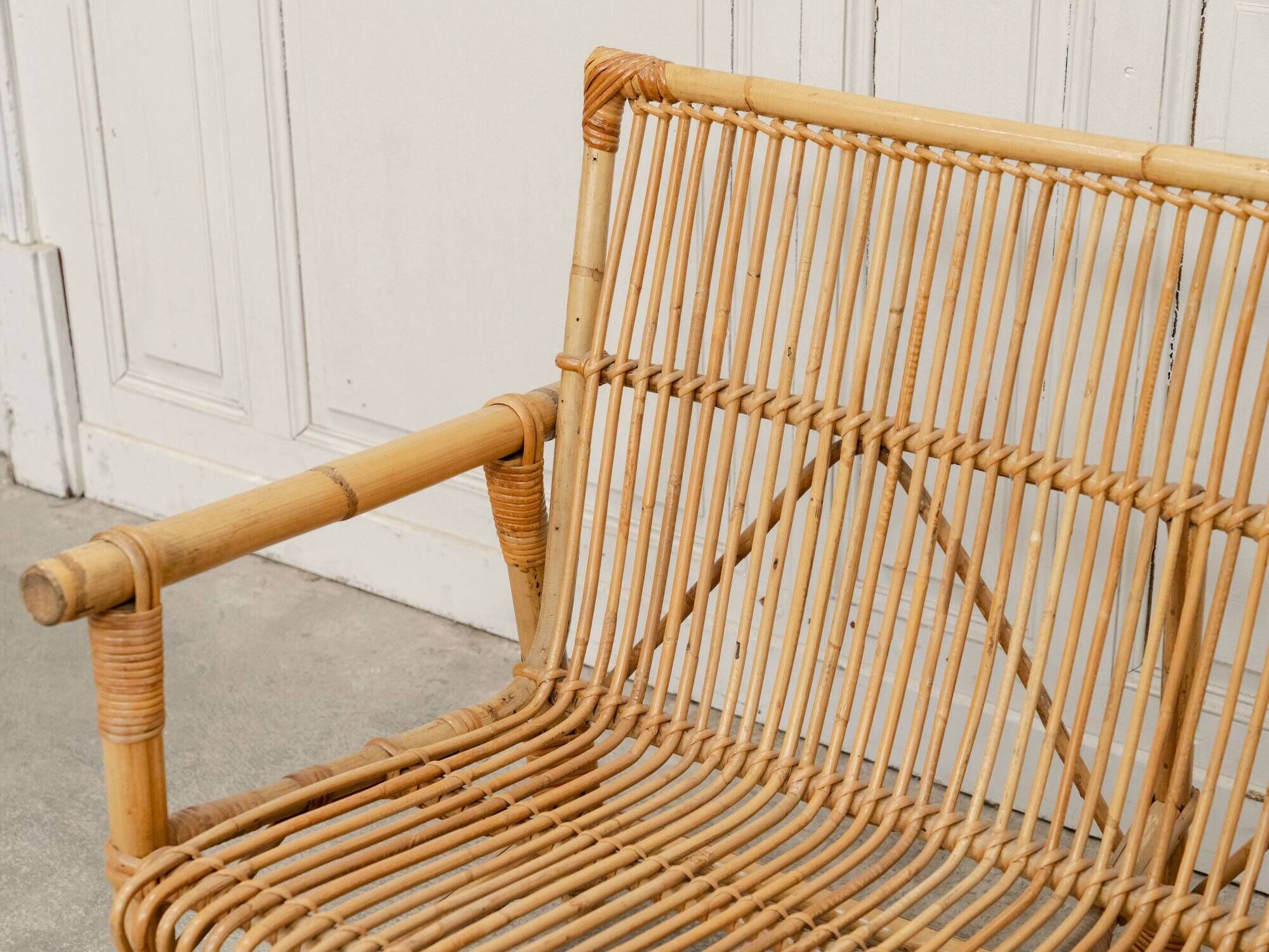 Vintage bamboo and rattan bench from the 1970s.