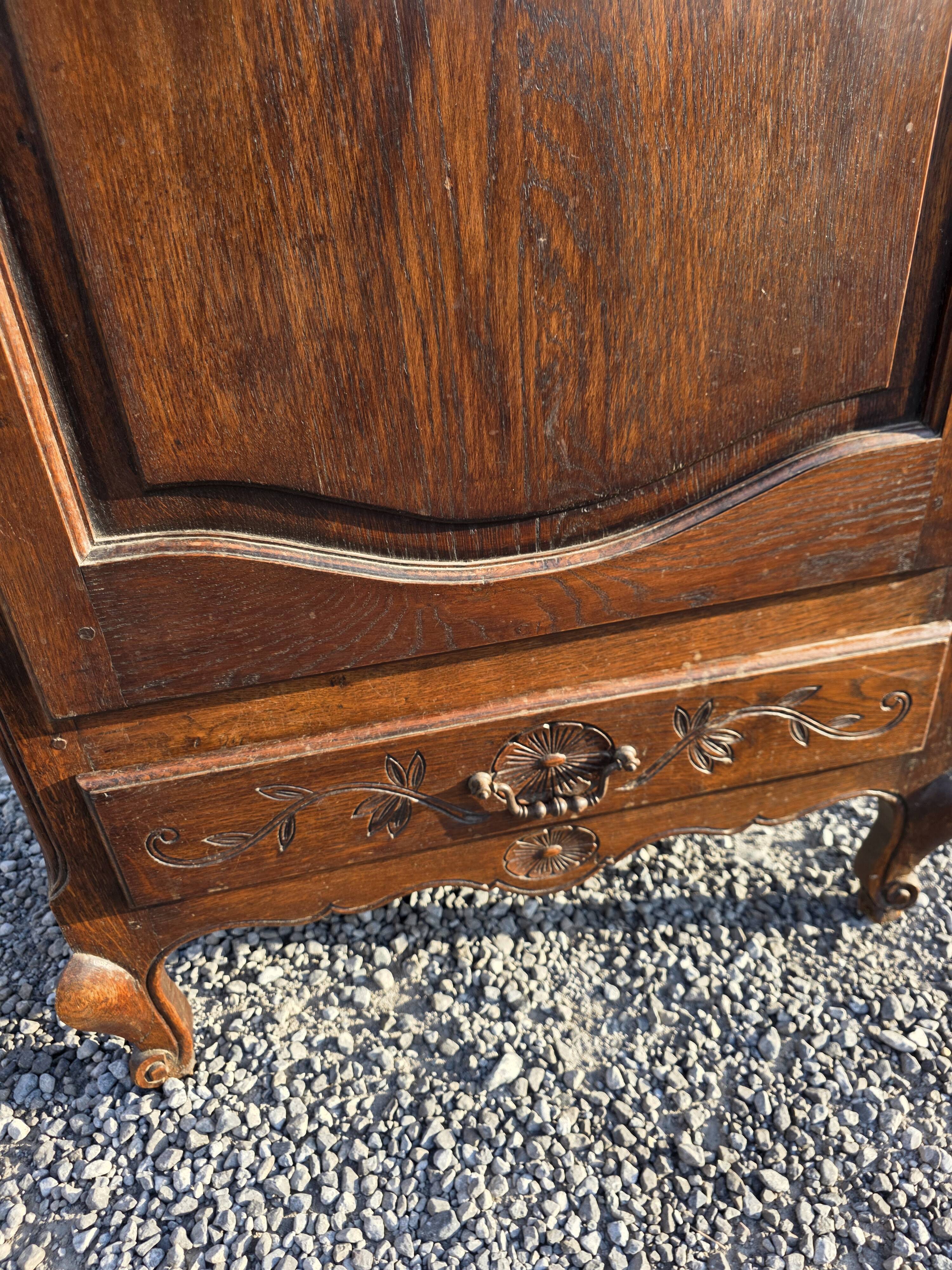 Louis XV style bonnetière in solid oak