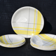 Yellow and white vintage plates Montreal 1960