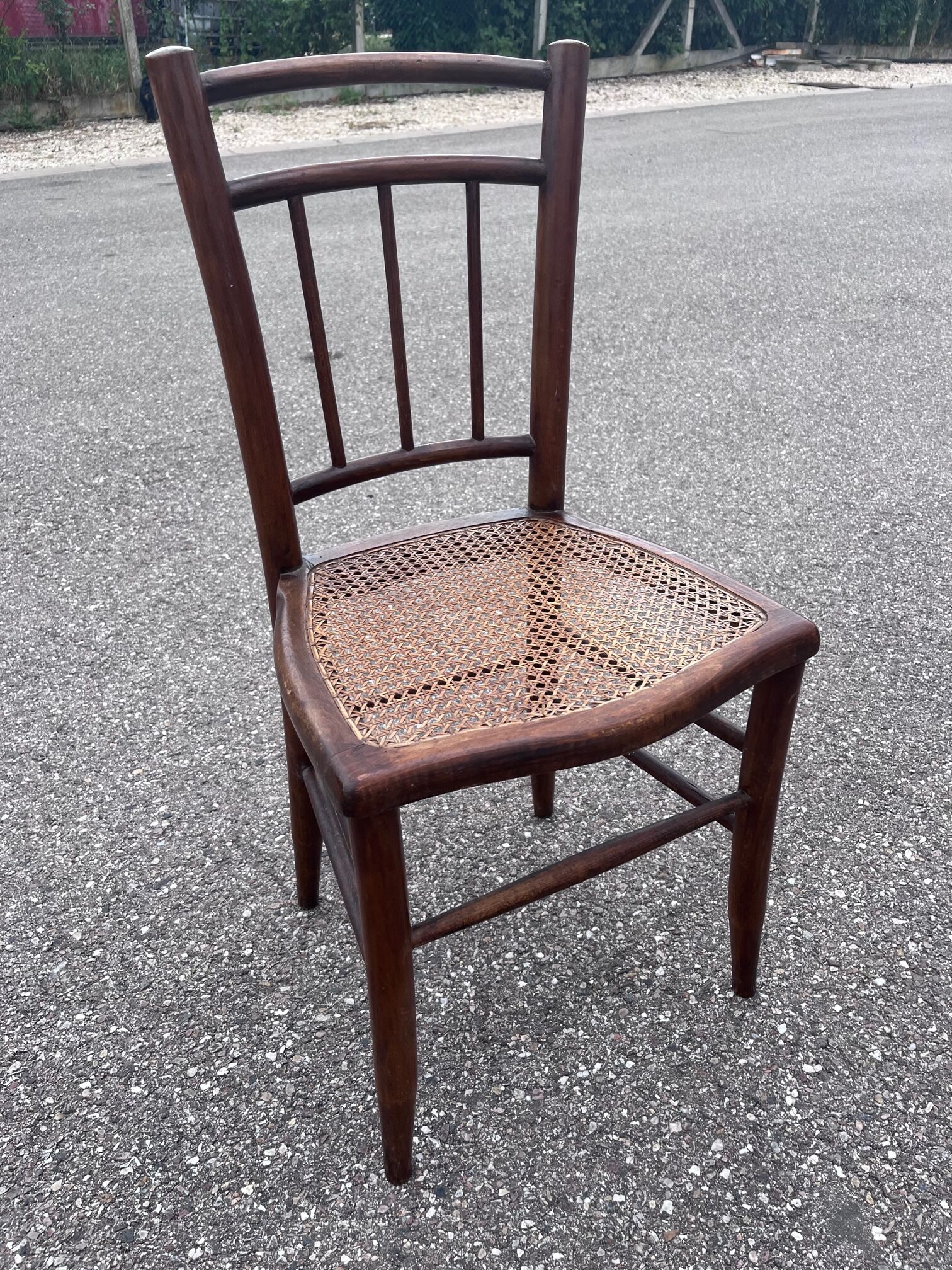 Pair of canned bistro chairs