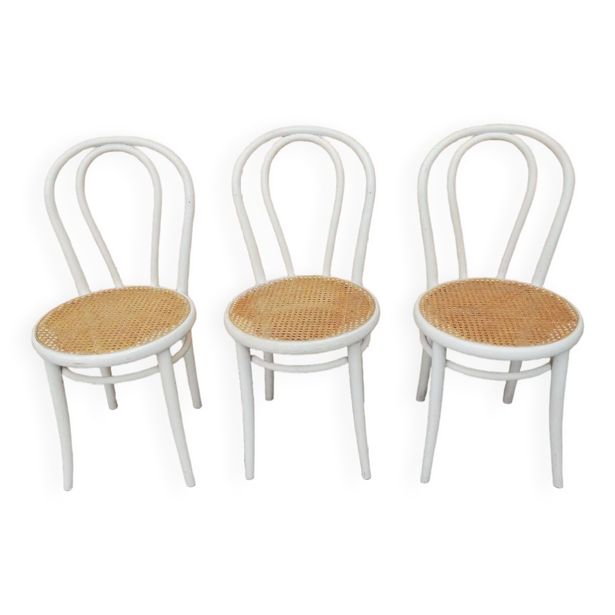 Lot of three Vintage ecru natural cane bistro chairs