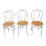 Lot of three Vintage ecru natural cane bistro chairs