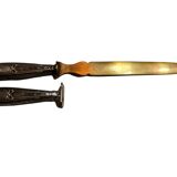 Paper cut with a stamp handle punches boar heads