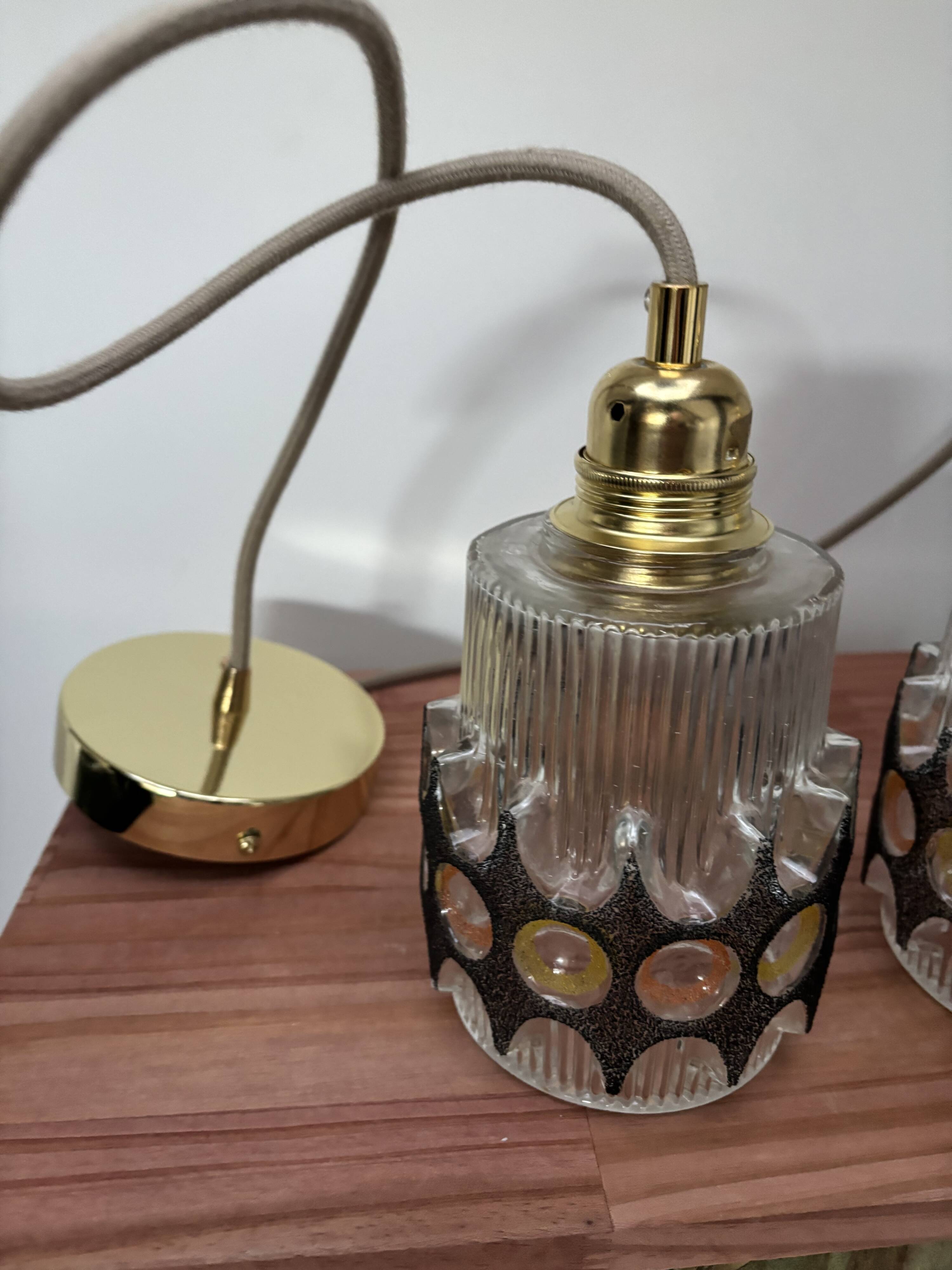 Pair of vintage faceted glass pendant lights