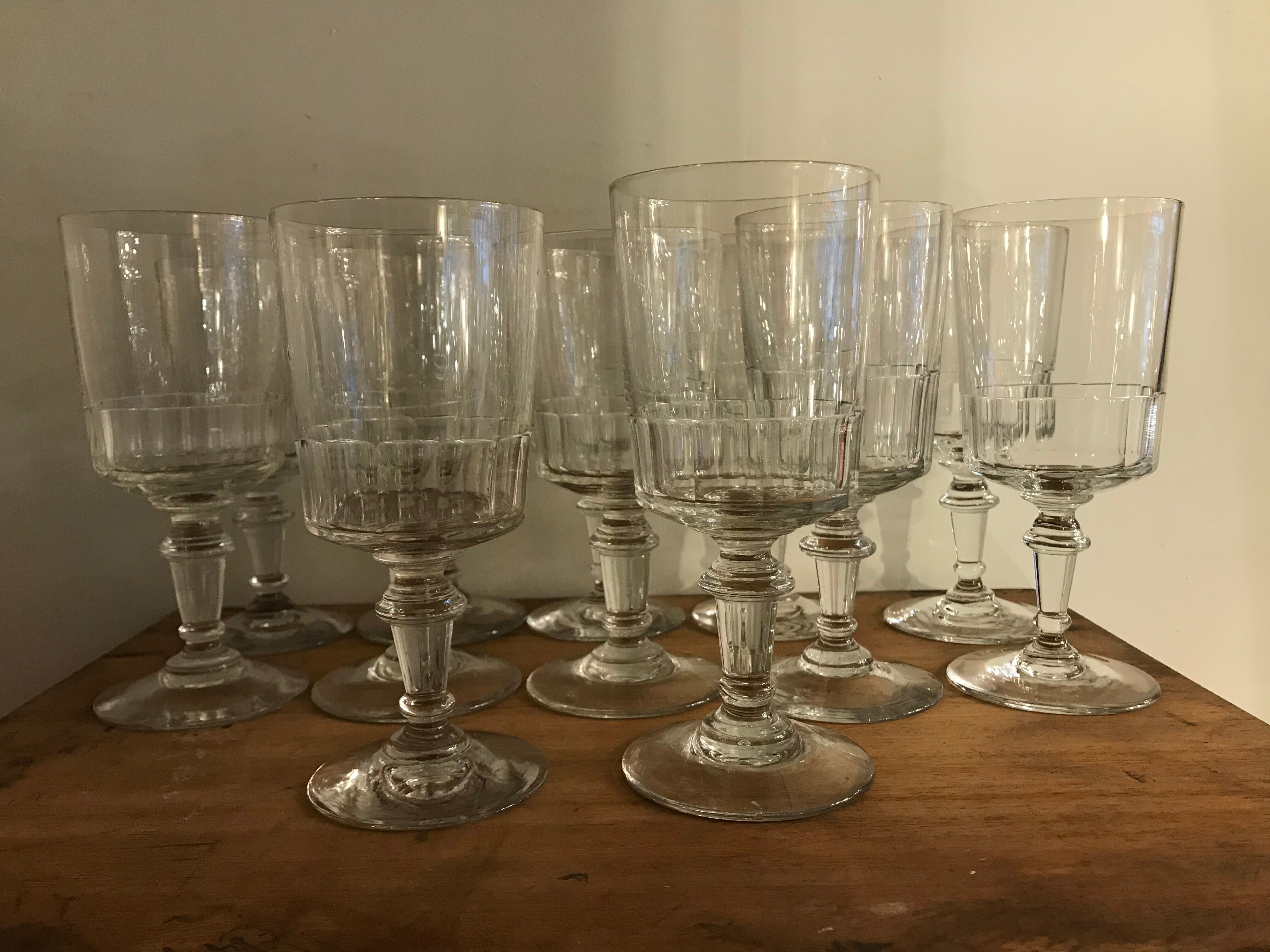 12 old and blown glass walking glasses
