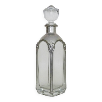 Magnificent crystal and silver-plated metal carafe bottle.