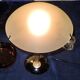 Table lamp legs chrome wood lampshade opaque glass.