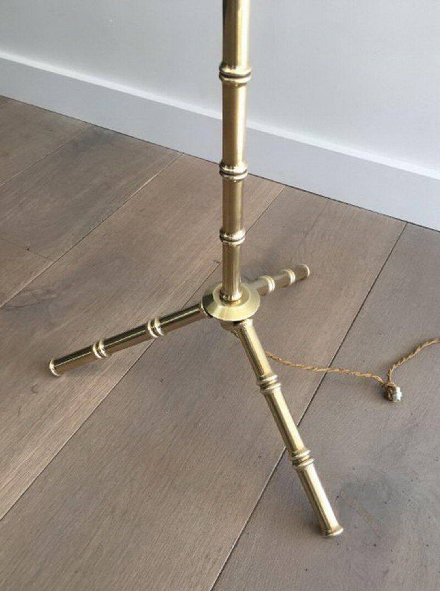 Floor lamp in faux-bamboo style, made of bronze and brass by Jacques Adnet
