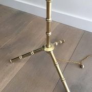 Floor lamp in faux-bamboo style, made of bronze and brass by Jacques Adnet