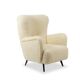 Armchair, or bergère, with its boucle fabric. 1950s