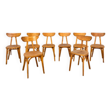 Set of 9 lutherma banana boomerang bistro chairs.