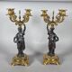 Pair of candelabra with women in the antique style of Napoleon III.