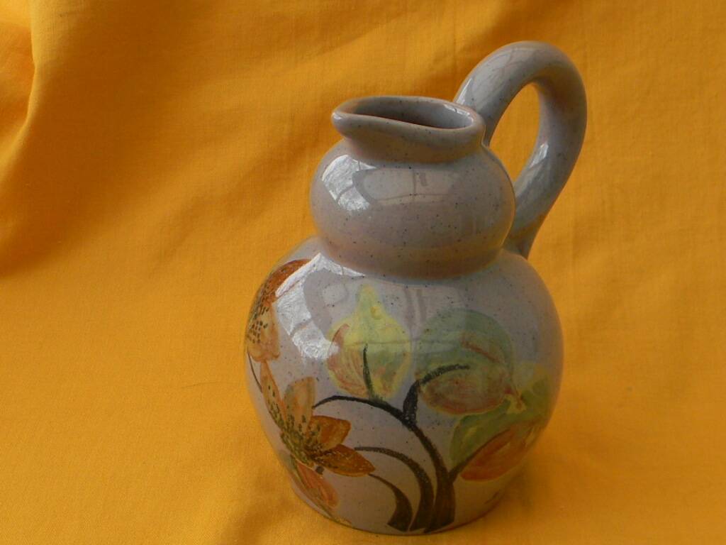 Ceramic pitcher by simone larrieu.