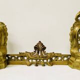 Louis XV style chiseled bronze firedog, 20th century