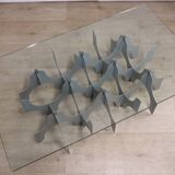 Minimalist sculptural coffee table in metal and glass