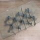 Minimalist sculptural coffee table in metal and glass