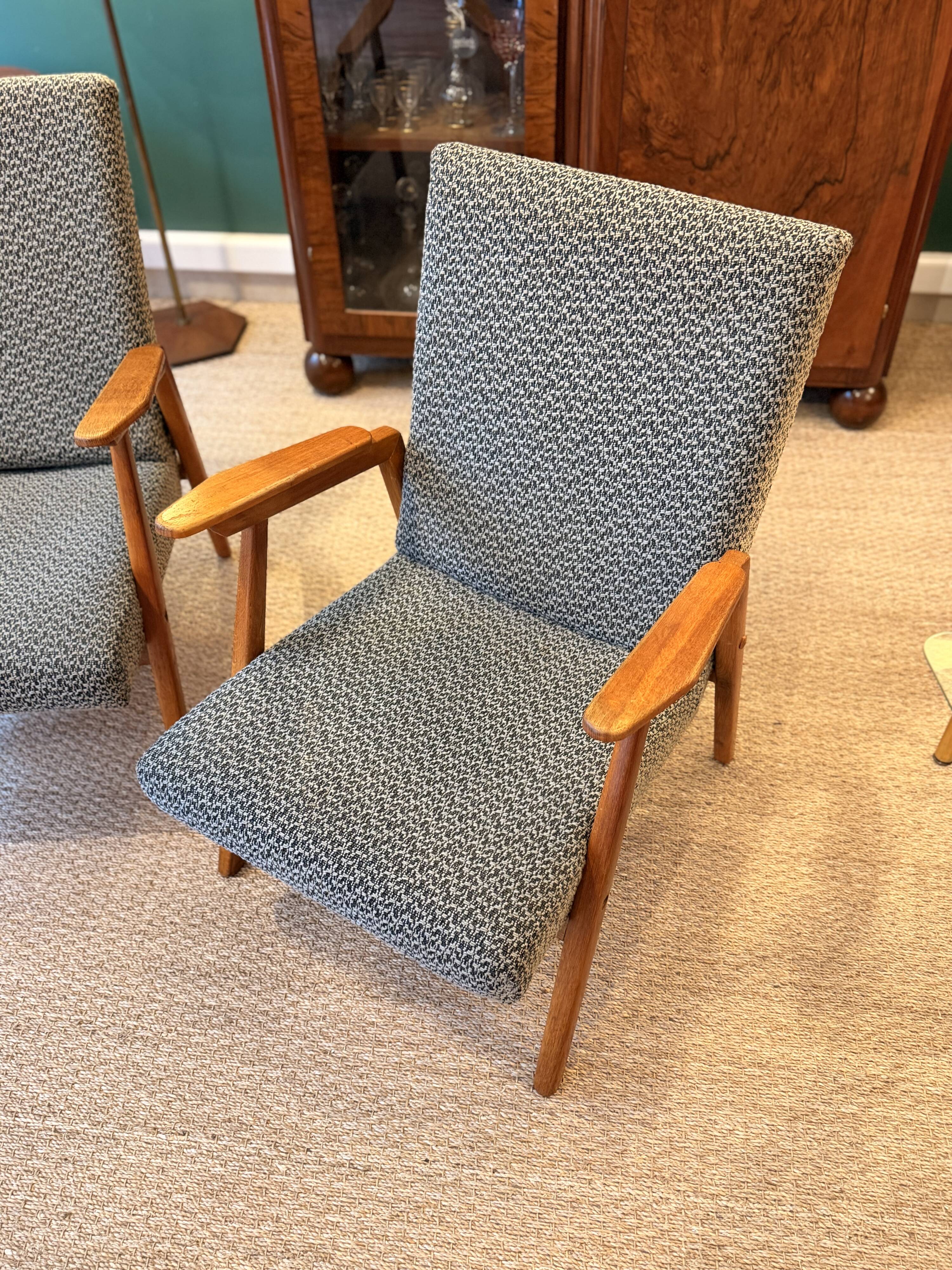 Pair of vintage oak armchairs, original fabric and seat.