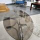 Chrome metal coffee table and oval smoked glass tray
