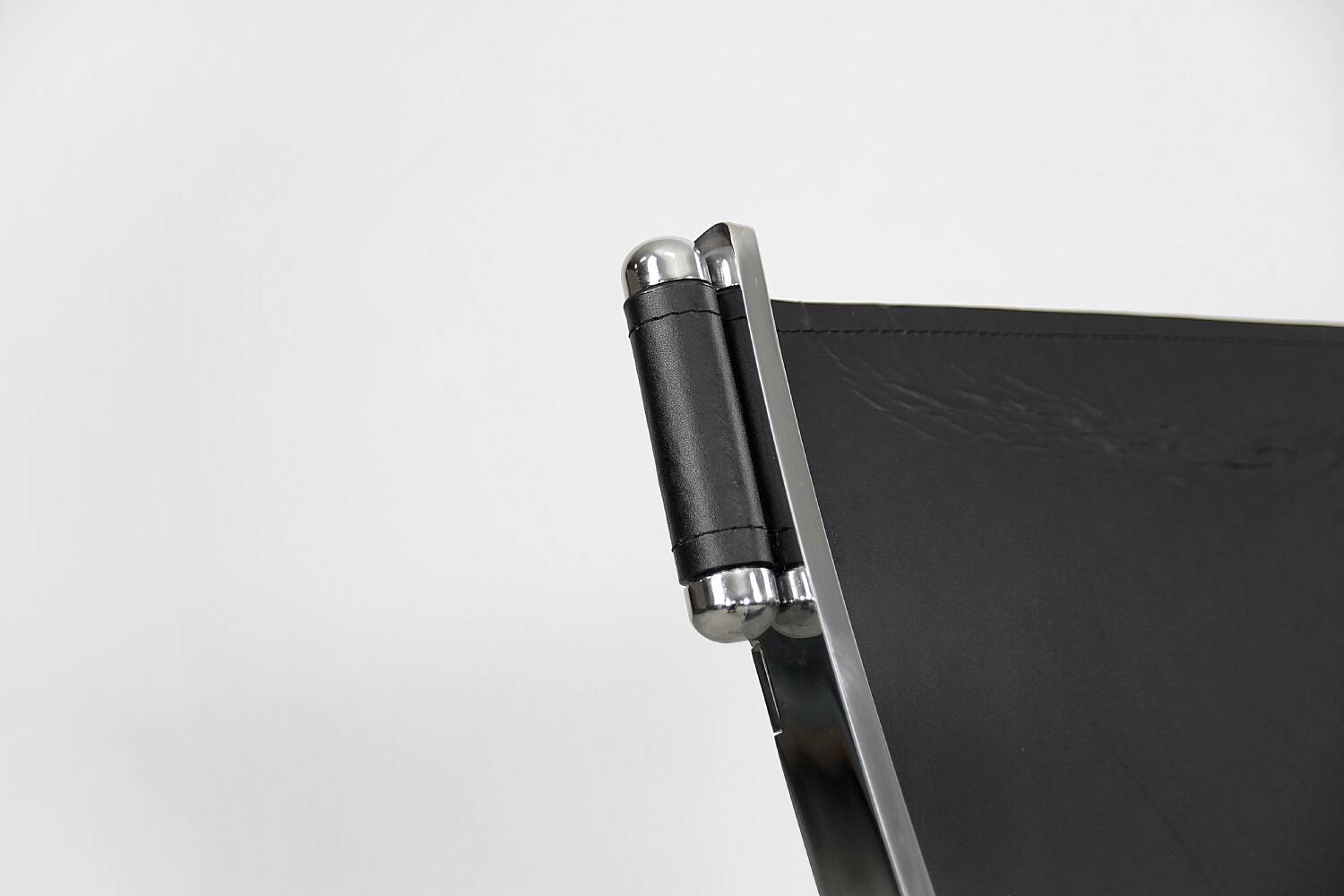 Vintage minimalist chair in Italian leather, 1980s.