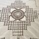 Net-style embroidered cotton tablecloth.