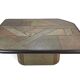 Table basse brutaliste Paul Kingma - pierre, ardoise et laiton