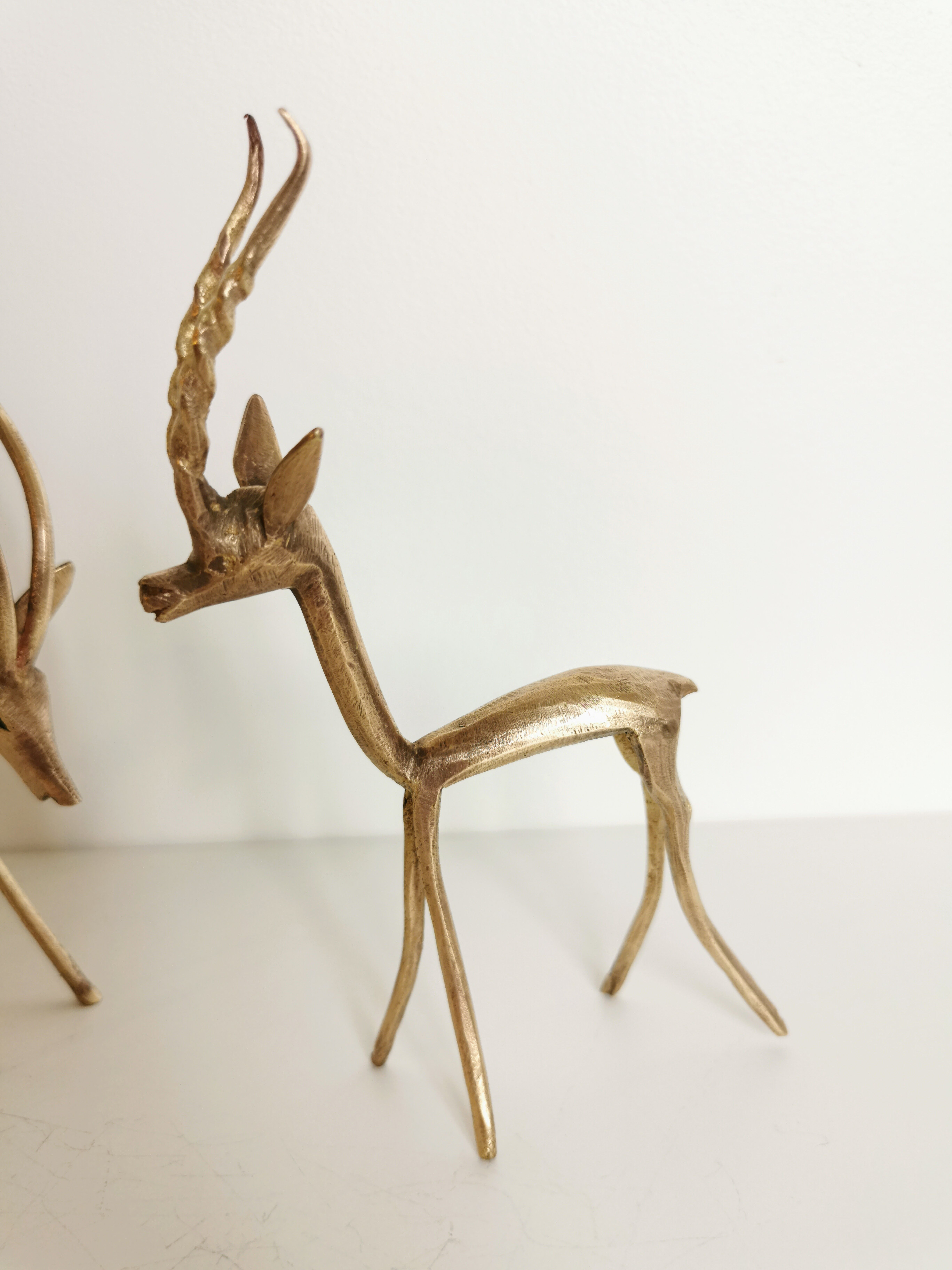 Trio of brass antelopes
