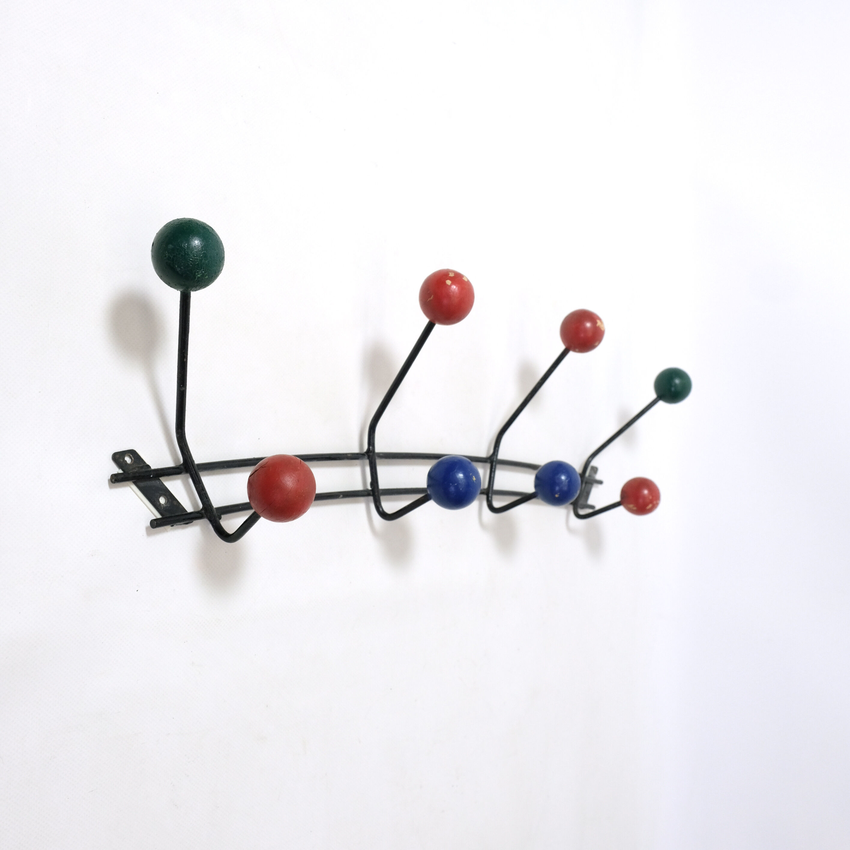 Multicolored wooden and metal coat holder