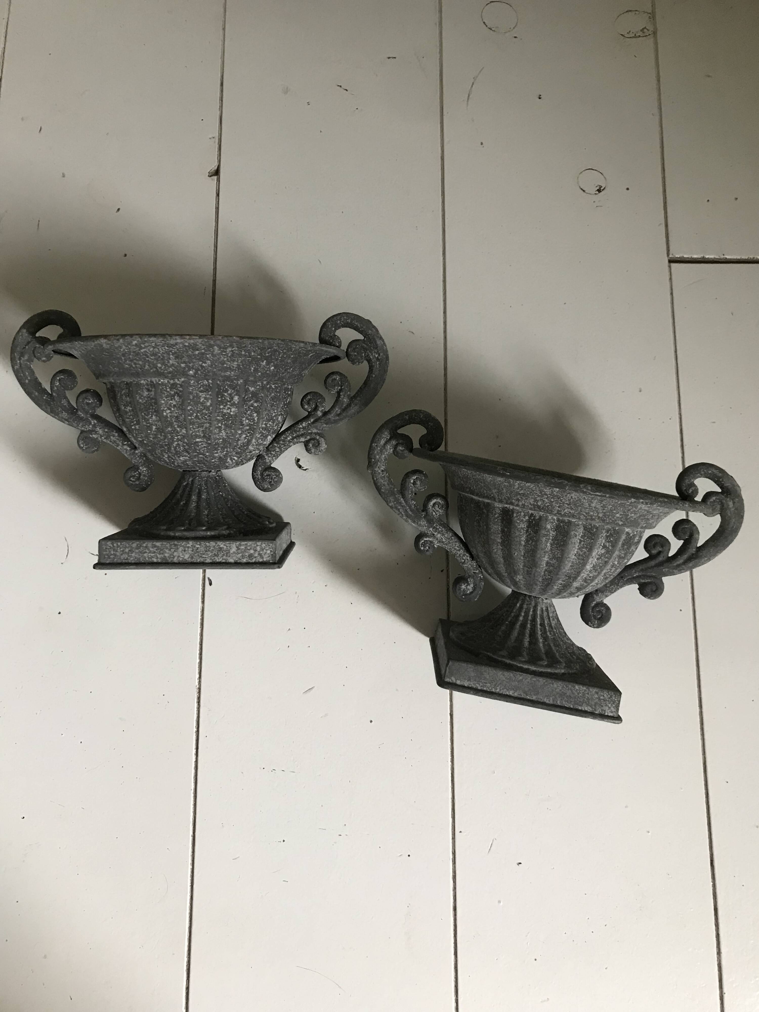 Small pair of zinc pots.