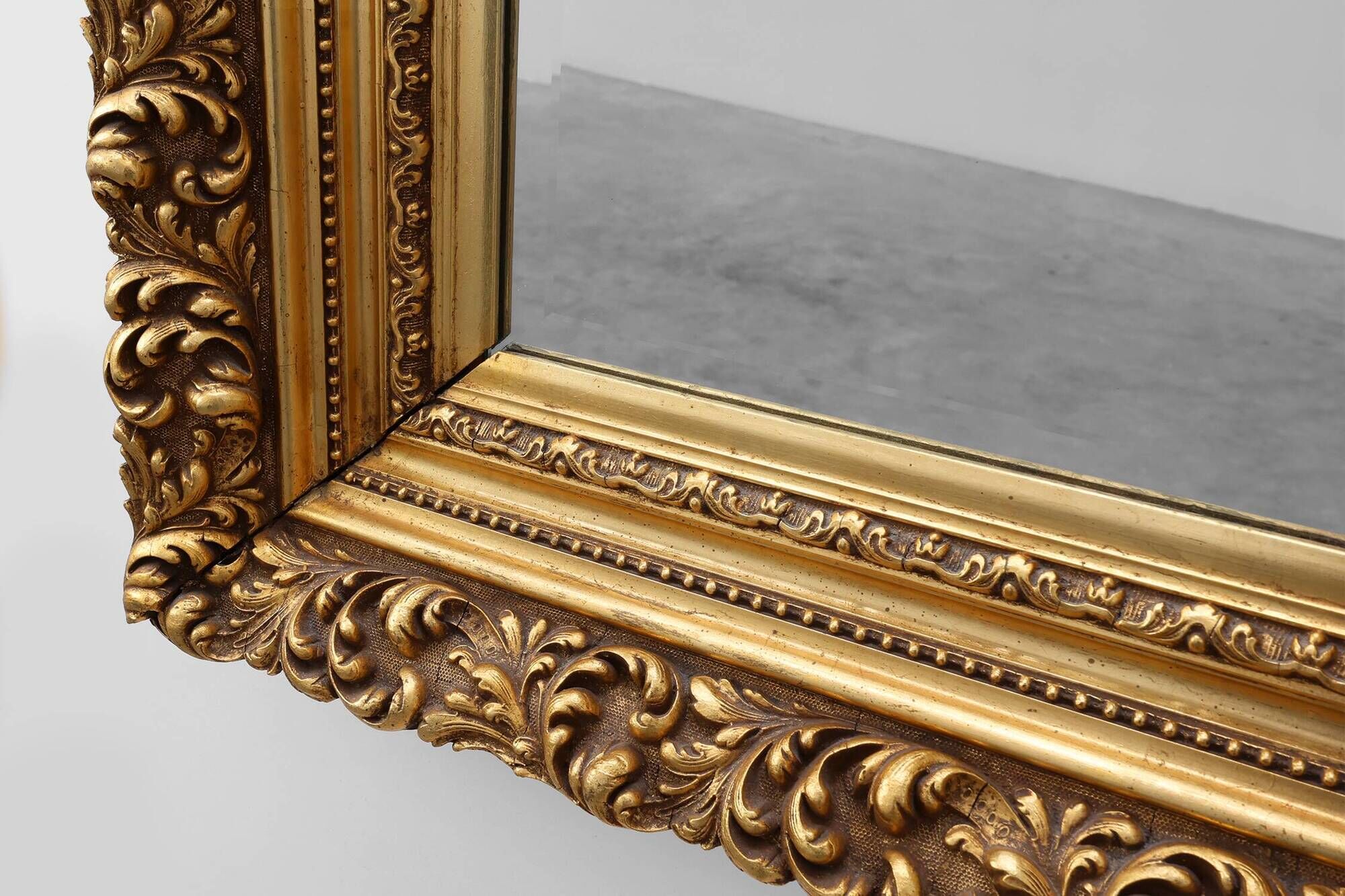Baroque style giltwood mirror with acanthus carvings, France ca. 1880