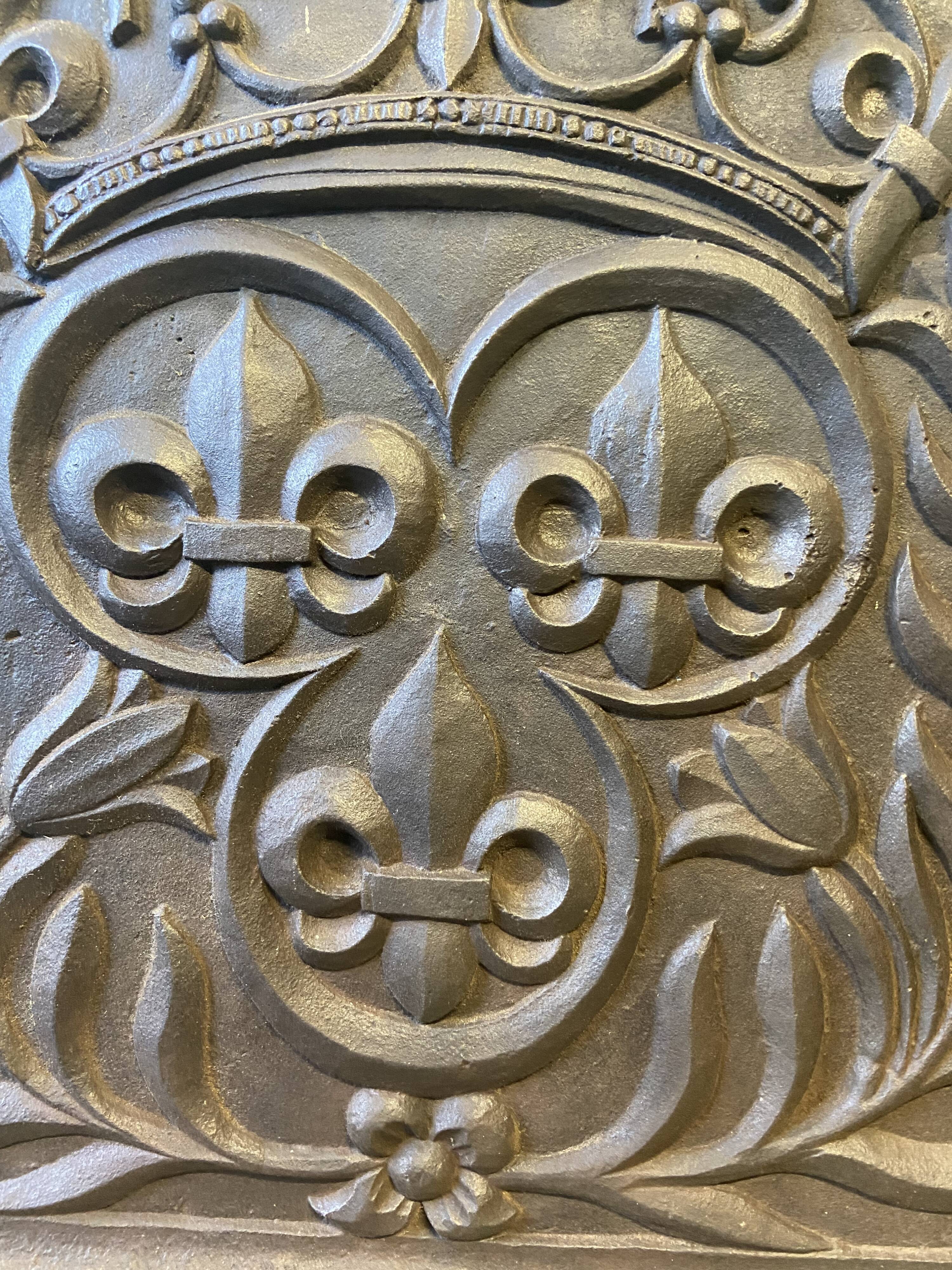 Fleur-de-lis fireplace plaque