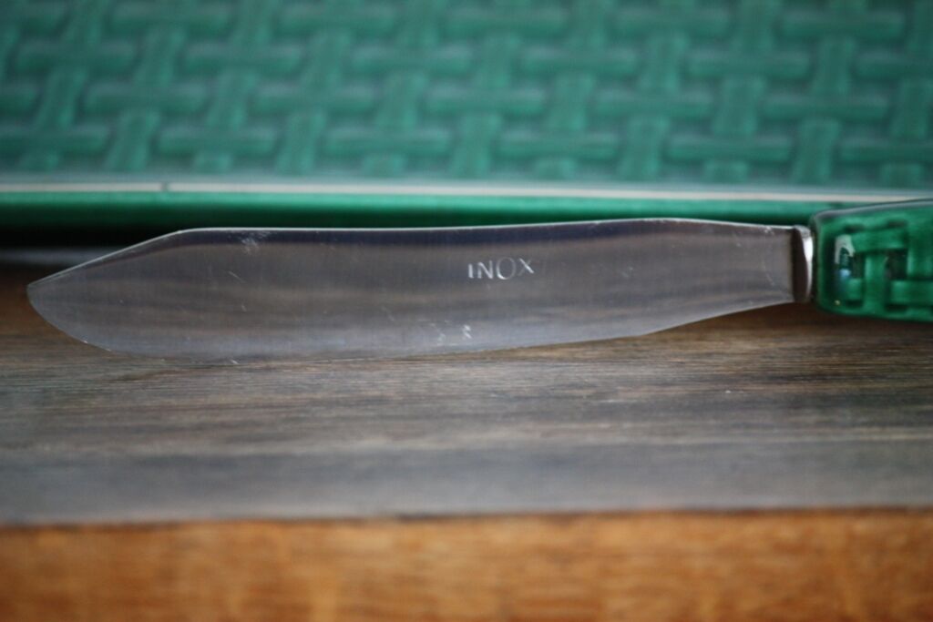 Green and gold ceramic dish